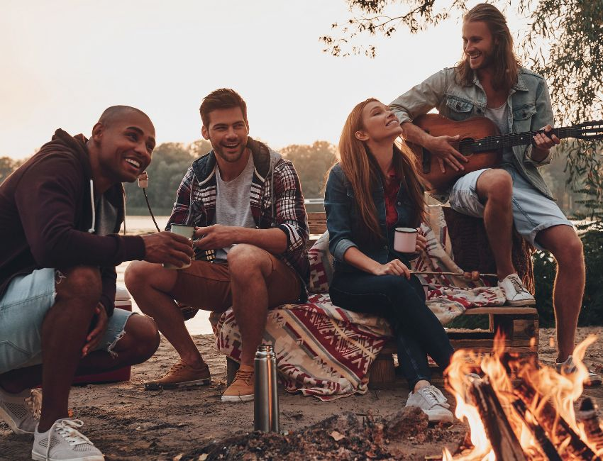 Group Play Music Next to Fire